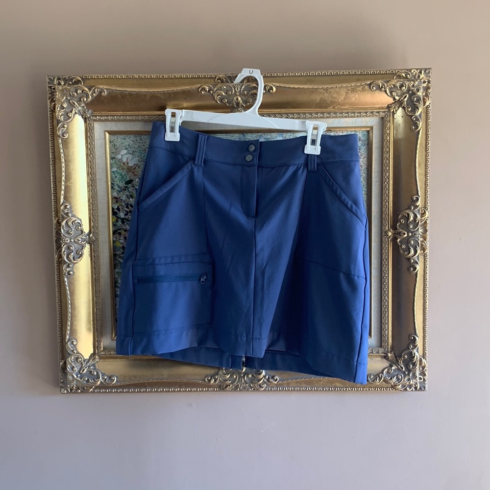 World Wide Sportsman, pale blue skort, size 4